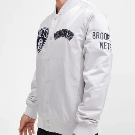 Brooklyn-Nets-Chest-Hit-Logo-Satin-White-Jacket.webp
